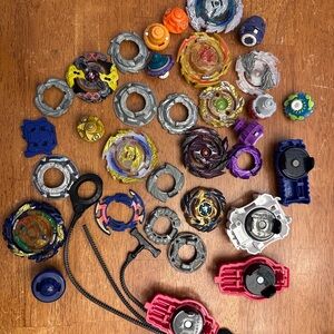 Assorted Beyblades and Parts - Multi Color